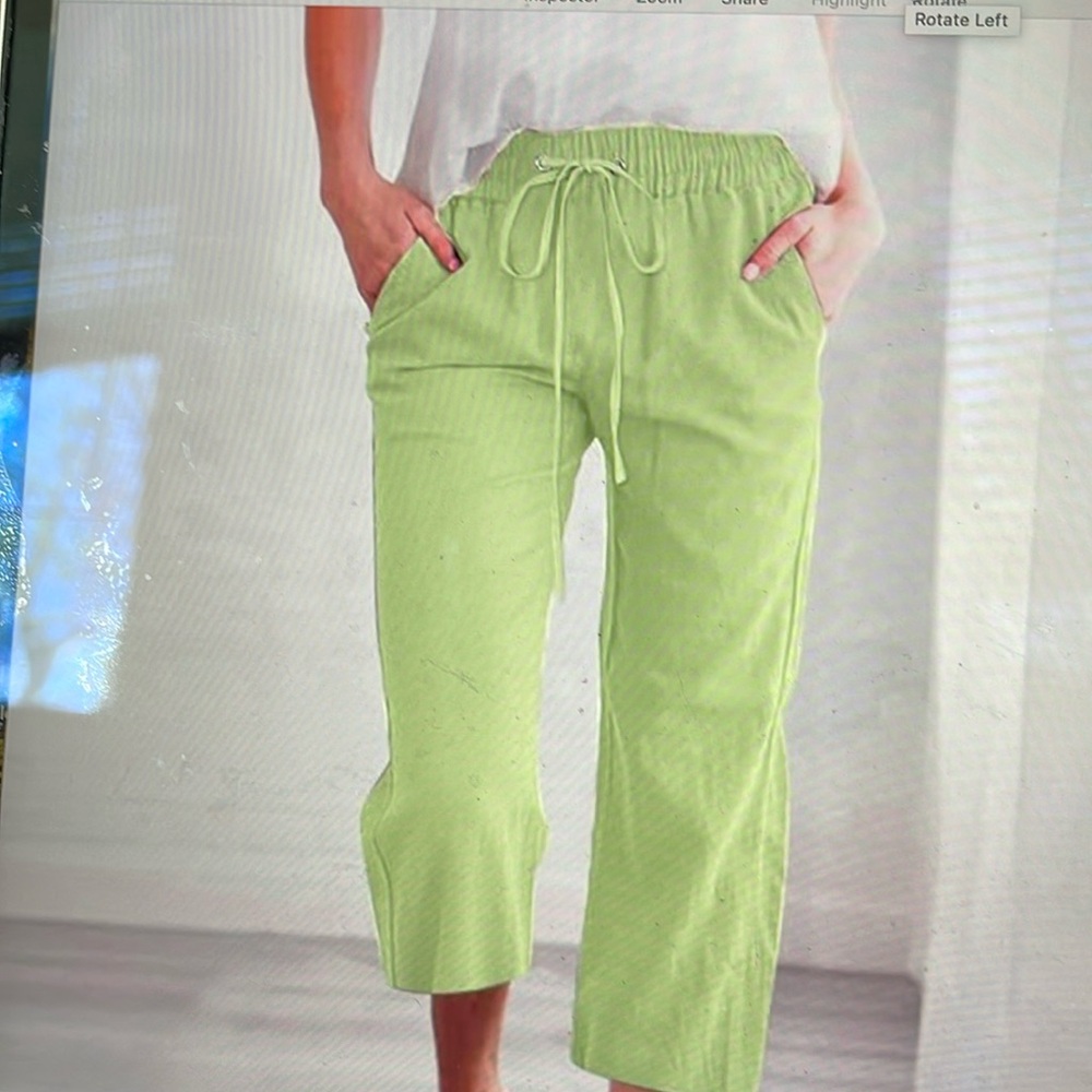 Women’s celery green relaxed fit capris, size M.